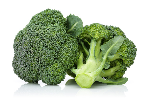 Fresh green broccoli isolated on white background. Studio shot